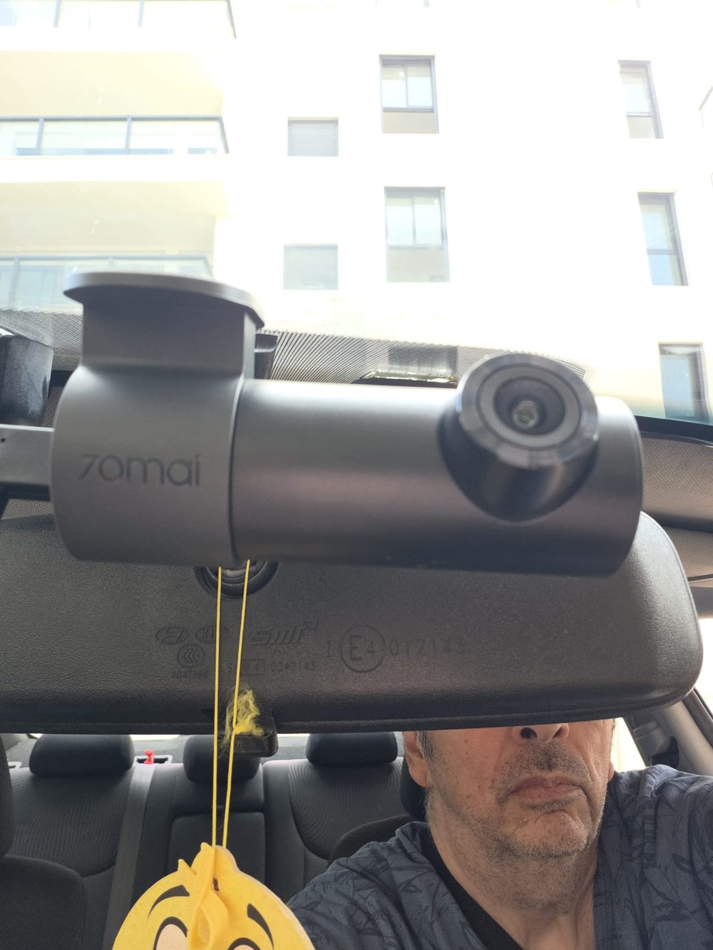 Avi, the author of Tipontech, with the 70mai M310 Plus dash cam mounted in his car
